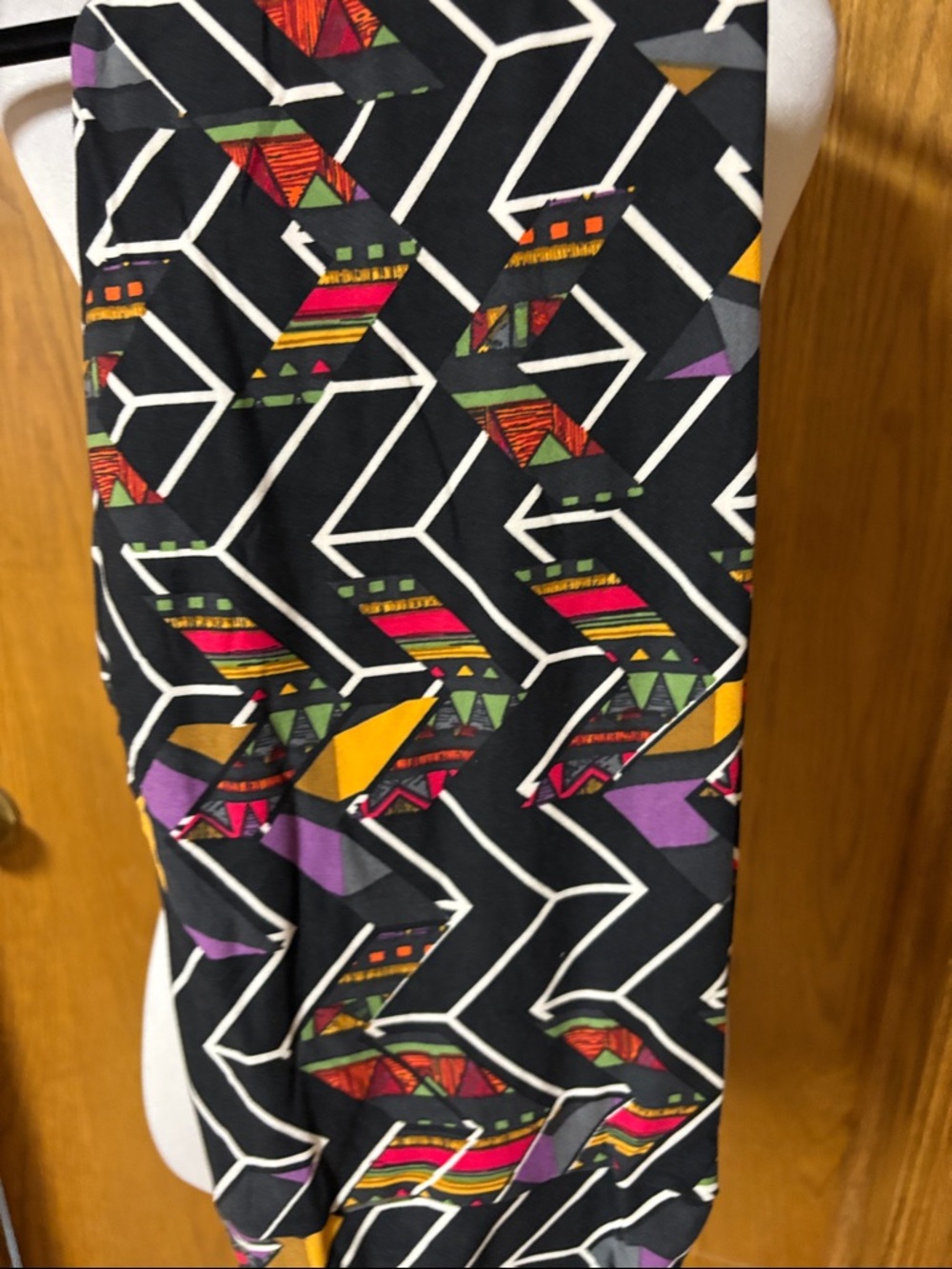 LuLaRoe Black Leggings with Purple, Yellow, Red & Green Geometric Print